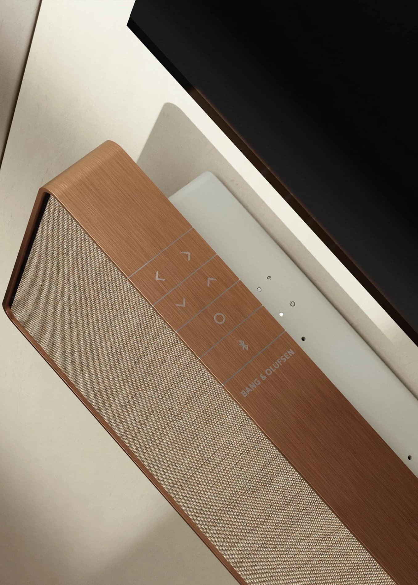 Exclusive and functional materials combine Scandinavian simplicity with state of the art audio technology. An endless frame of long line standing aluminium or smoked oak surrounds the textile of the speaker front.